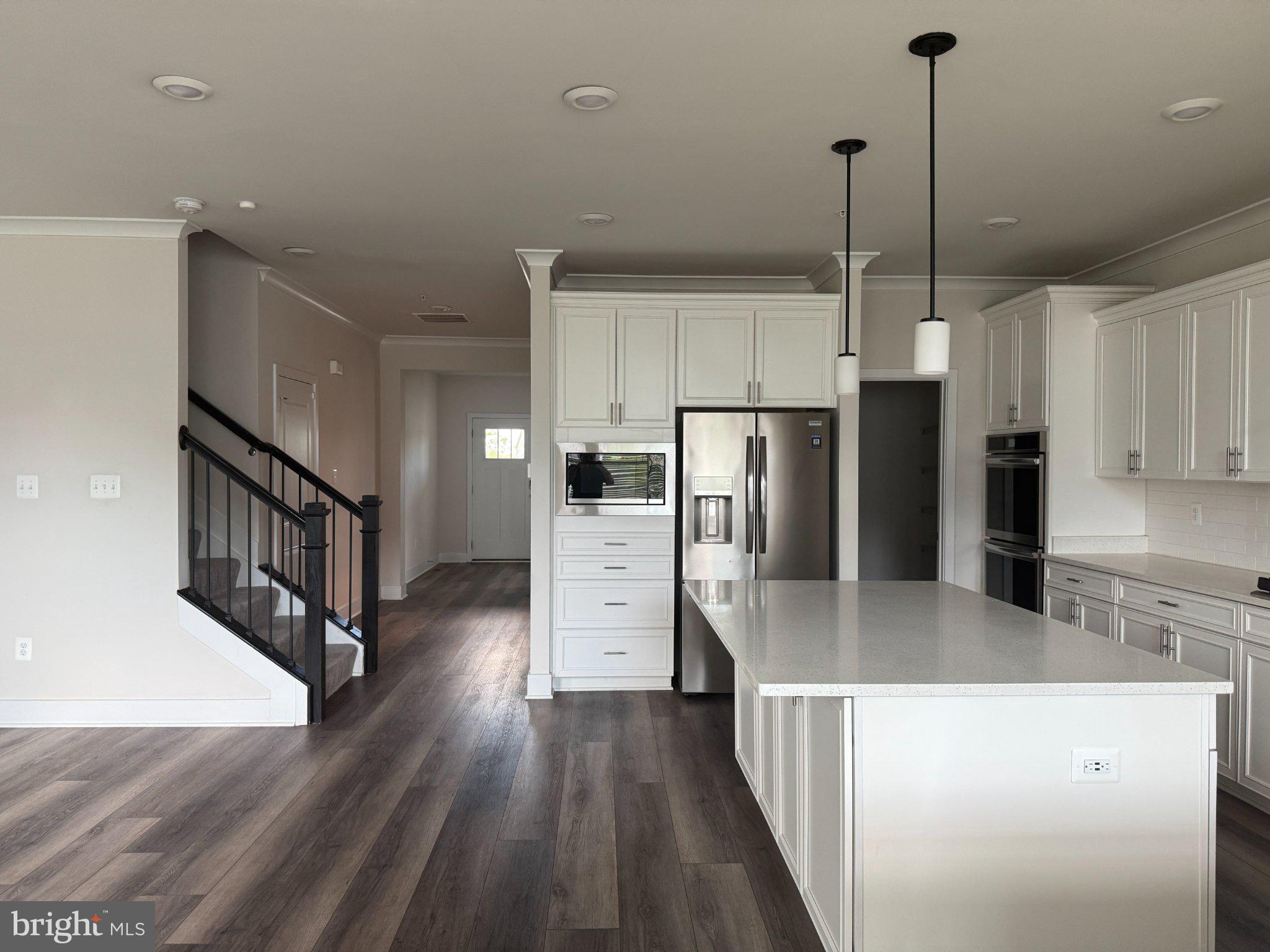 1407 Pinkerton Street Brunswick, MD 21716 - Photo 6 of 21 Modern kitchen with sleek finishes.