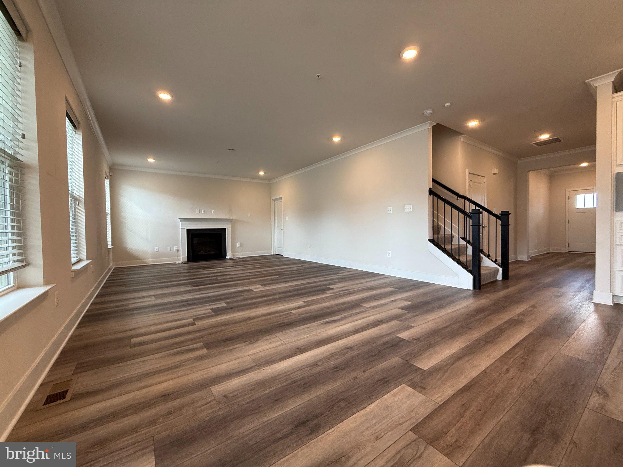 1407 Pinkerton Street Brunswick, MD 21716 - Photo 7 of 21 Spacious living area with modern charm.