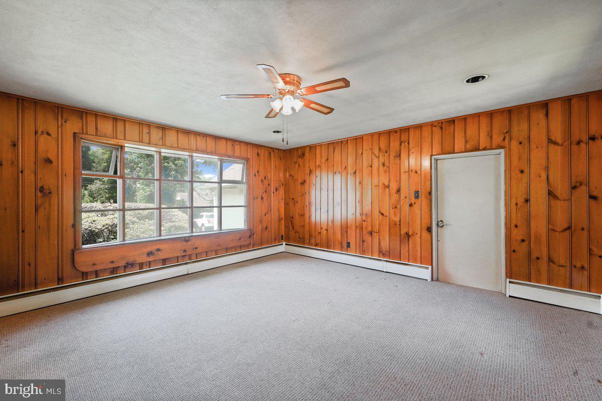 327 South Waterloo Road Devon, PA 19333 - Photo 11 of 36 Family Room with Wall of Windows