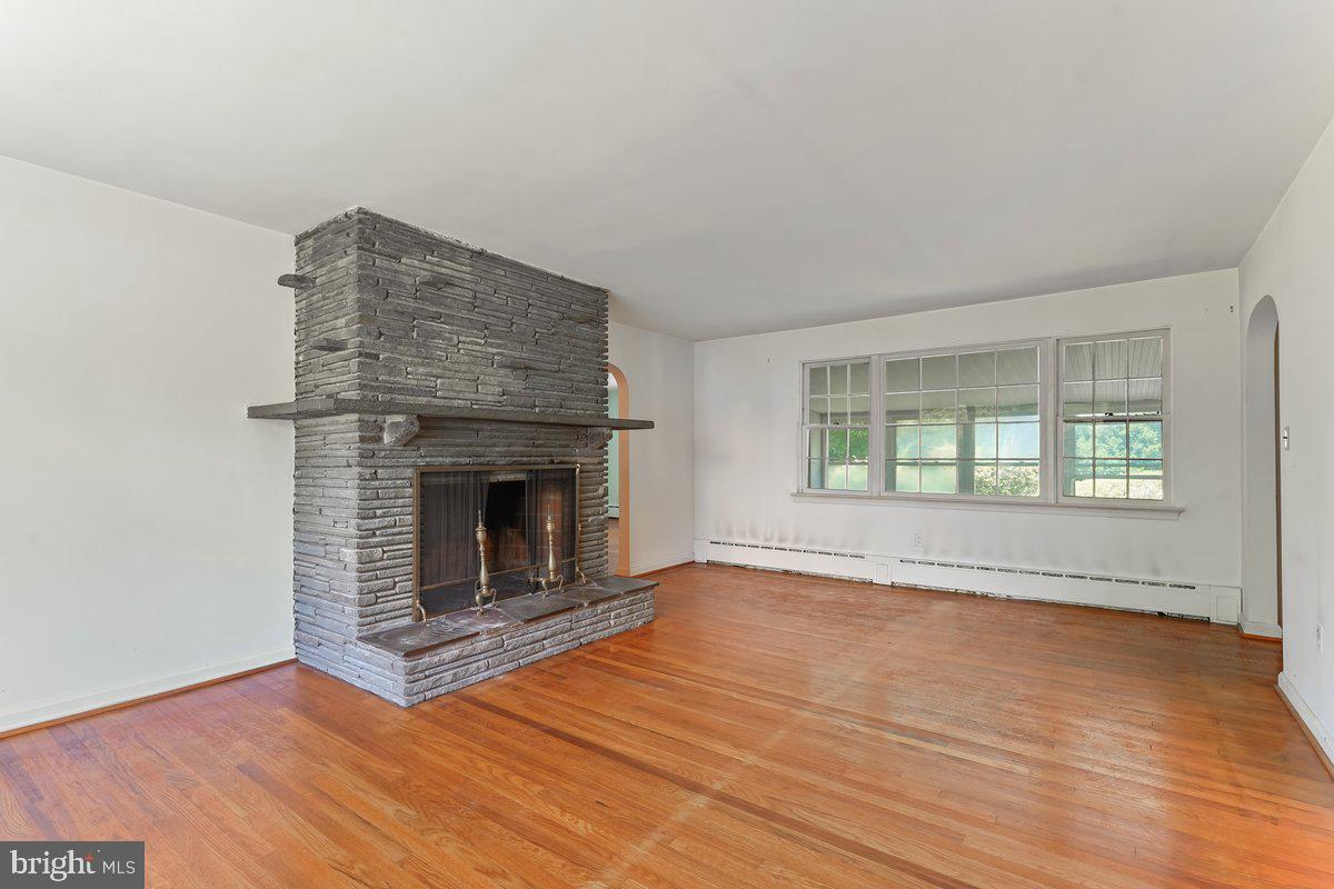 327 South Waterloo Road Devon, PA 19333 - Photo 5 of 36 Living Room with Wall of Windows