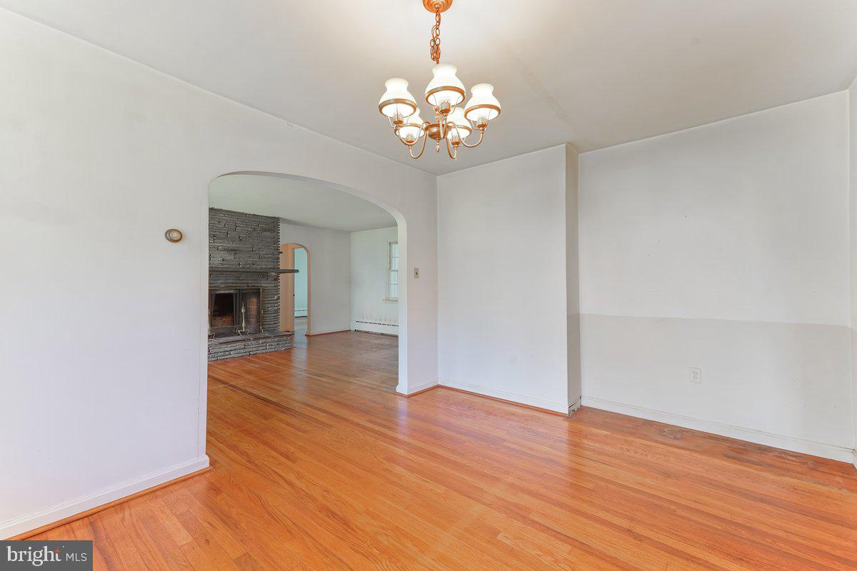 327 South Waterloo Road Devon, PA 19333 - Photo 6 of 36 Formal Dining Room with Hardwood Flooring