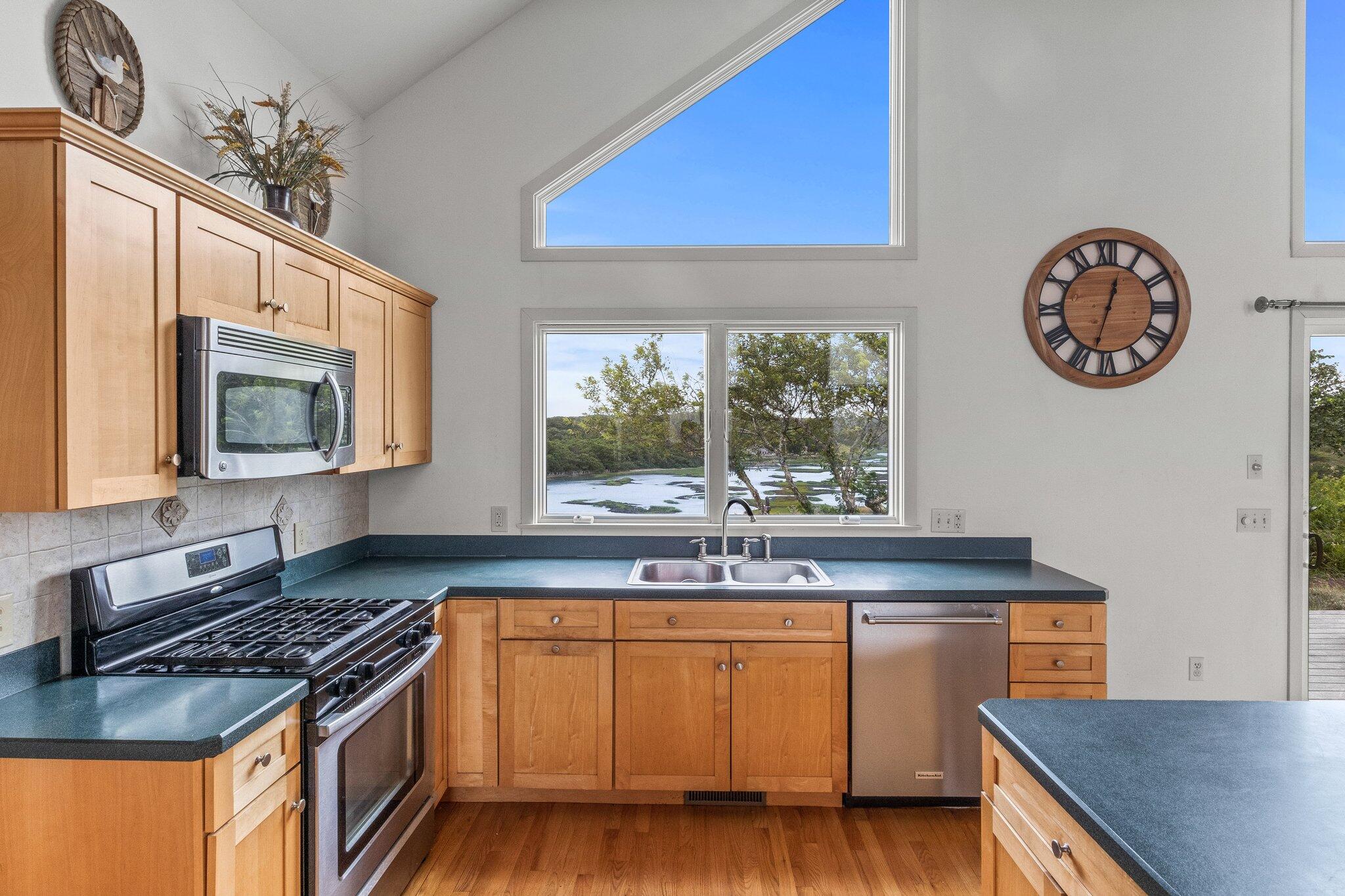 25 Great Hills Road Truro, MA 02666 - Photo 12 of 68 a kitchen with a stove and a sink