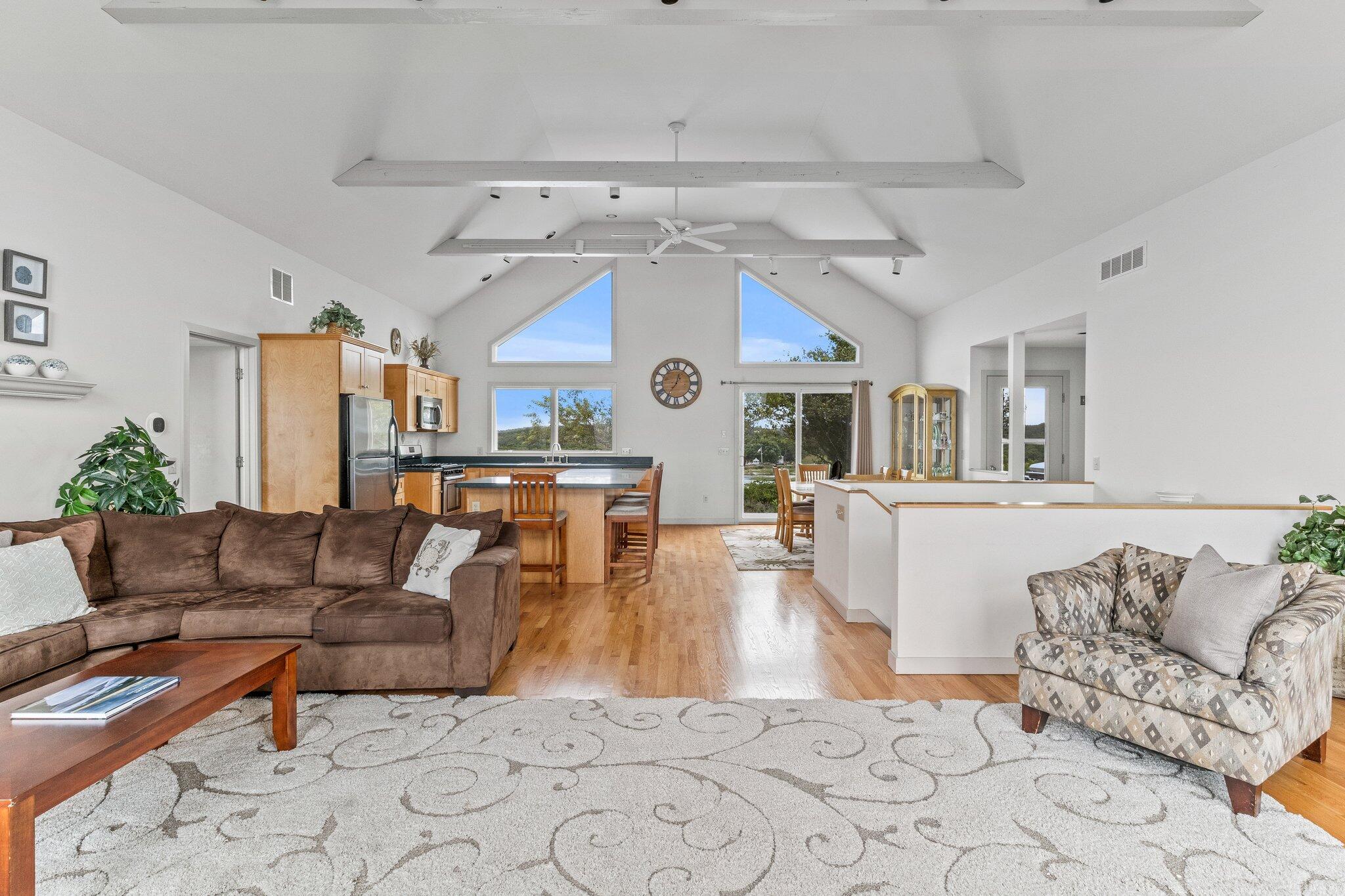 25 Great Hills Road Truro, MA 02666 - Photo 17 of 68 a living room with furniture and a large window