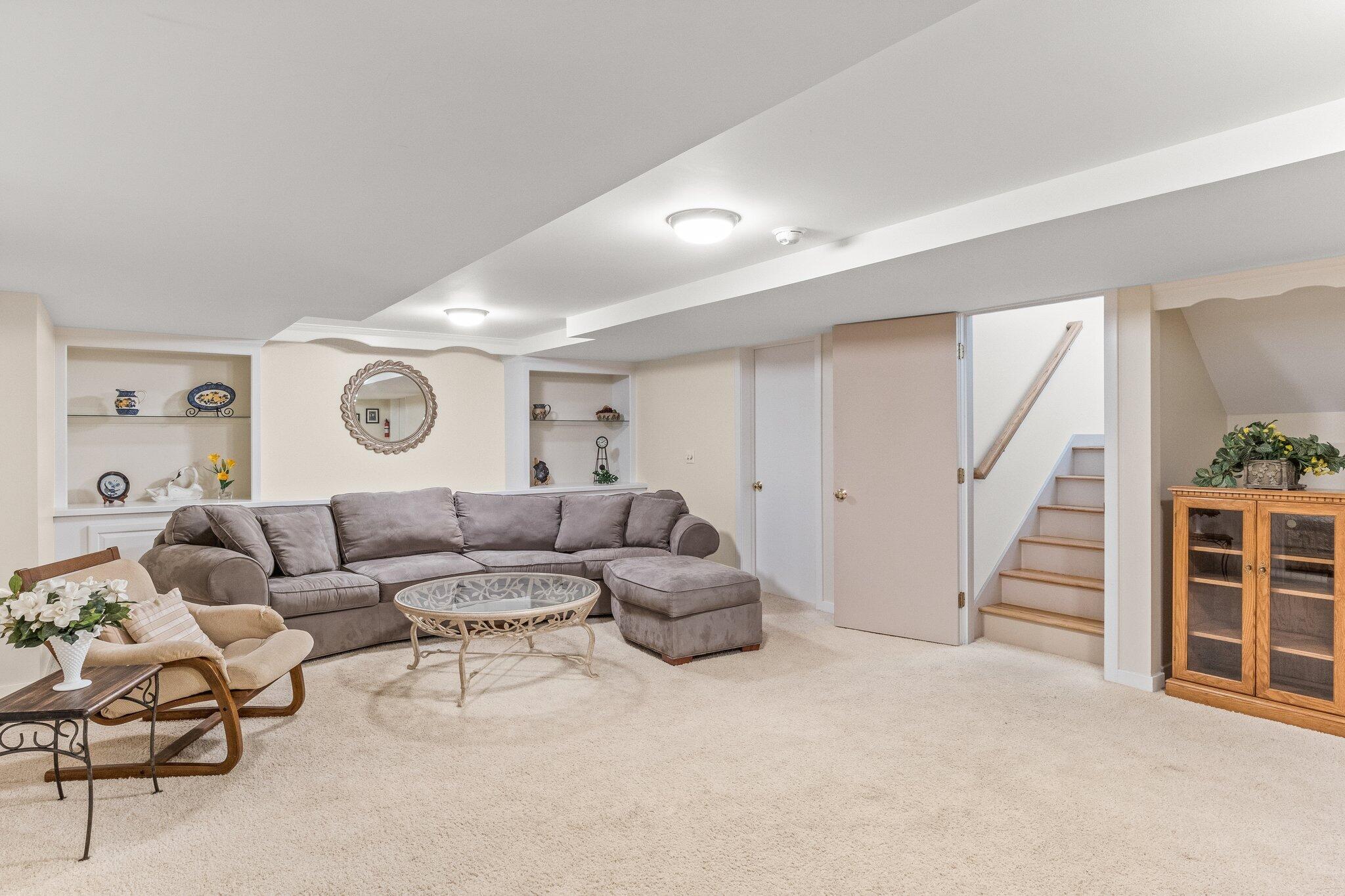 25 Great Hills Road Truro, MA 02666 - Photo 30 of 68 a living room with furniture and a large window
