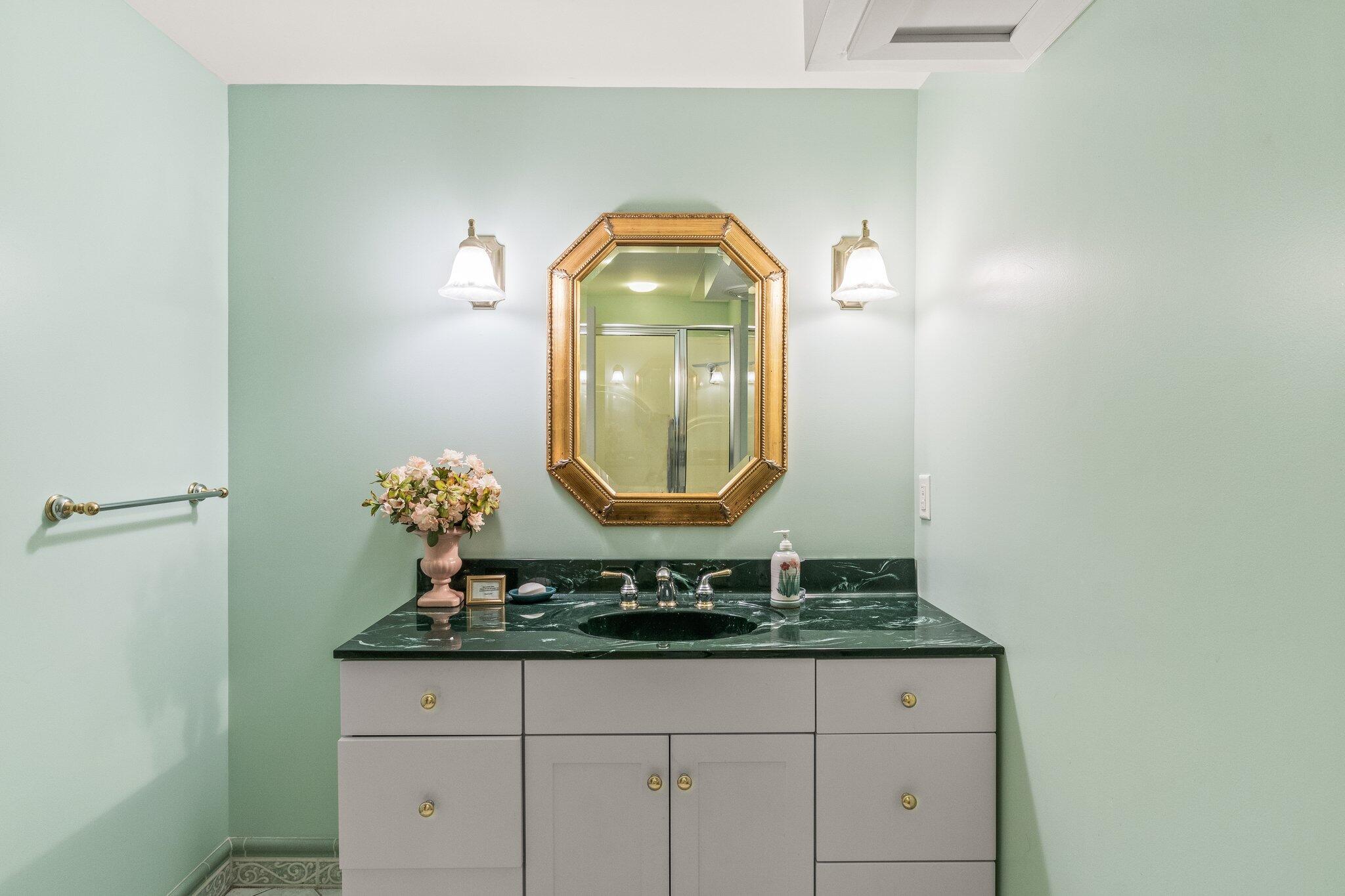 25 Great Hills Road Truro, MA 02666 - Photo 40 of 68 a bathroom with a sink and a mirror
