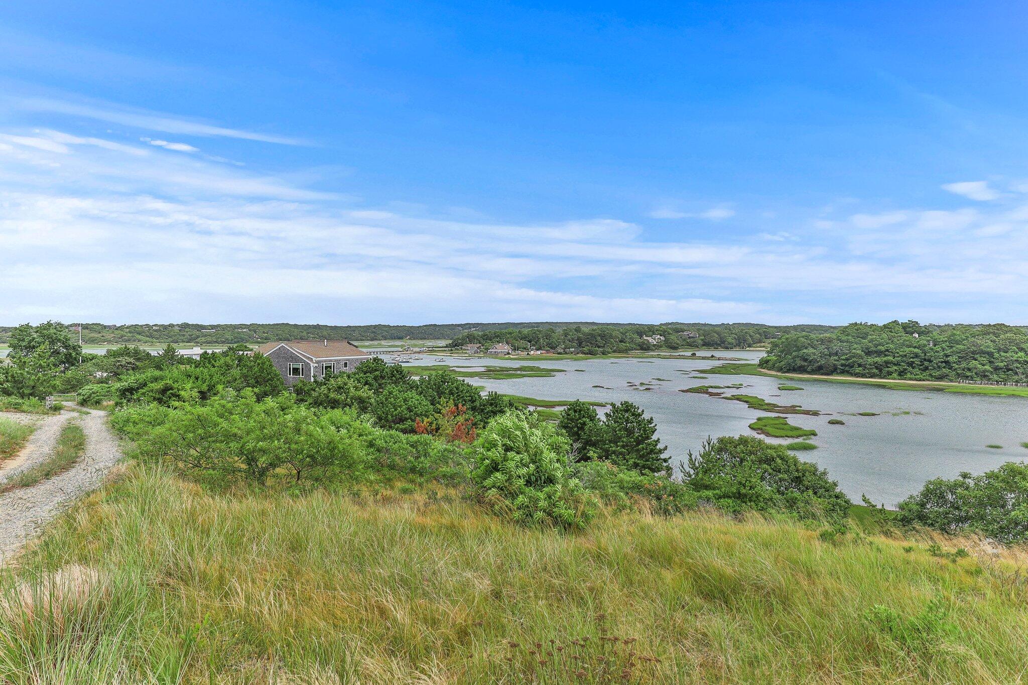 25 Great Hills Road Truro, MA 02666 - Photo 43 of 68 a view of a lake with a yard