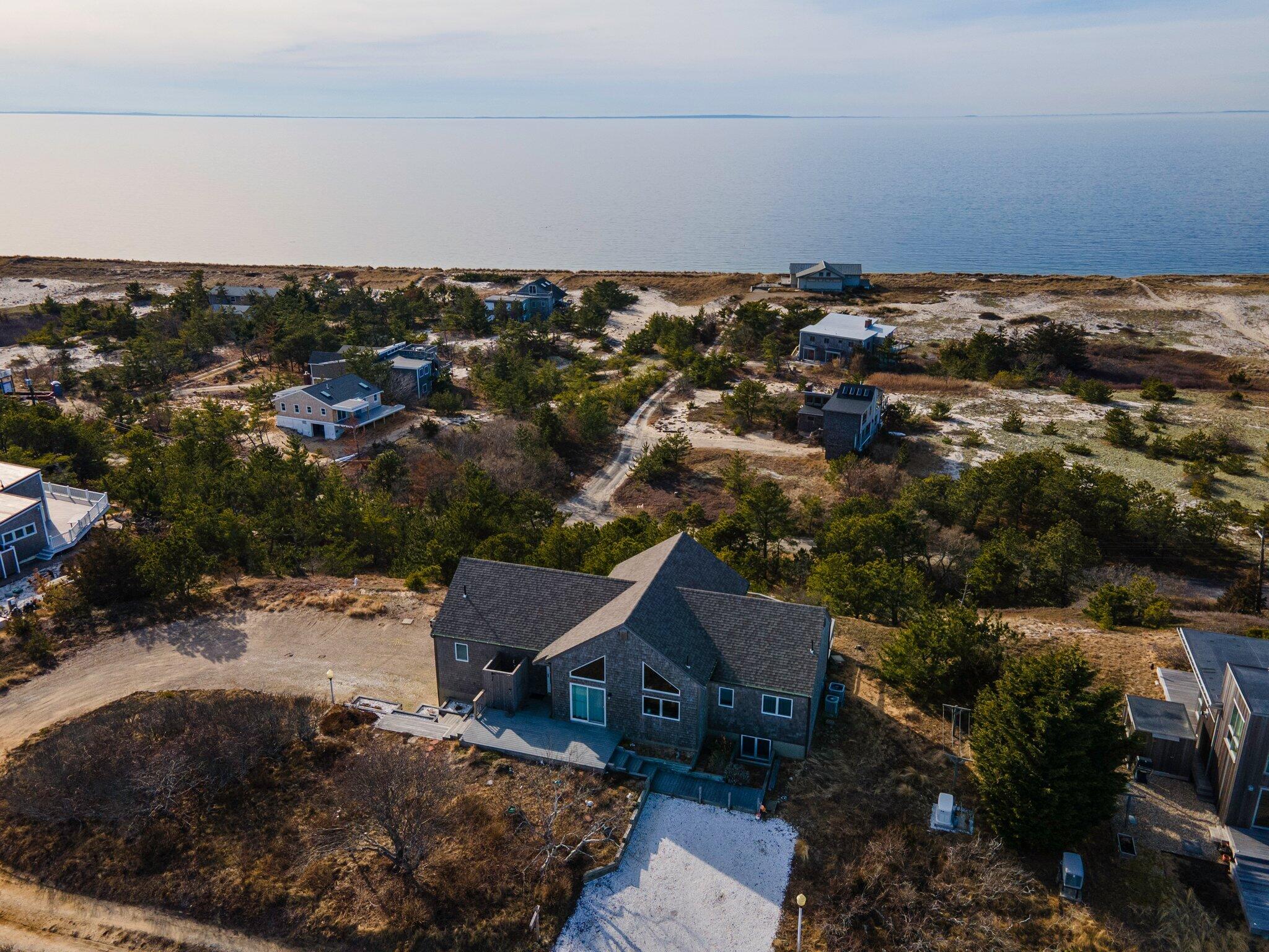 25 Great Hills Road Truro, MA 02666 - Photo 49 of 68 an aerial view of a house with a yard