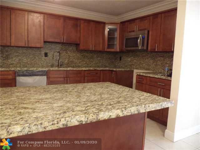 25 Northwest 45th Avenue Plantation, FL 33317 - Photo 4 of 11 Exterior Front