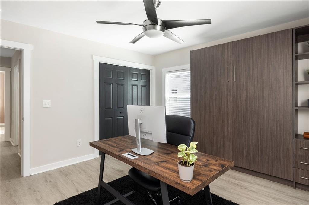 1675 Alvarado Terrace Southwest Atlanta, GA 30310 - Photo 14 of 26 a view of a dining room with furniture window and wooden floor