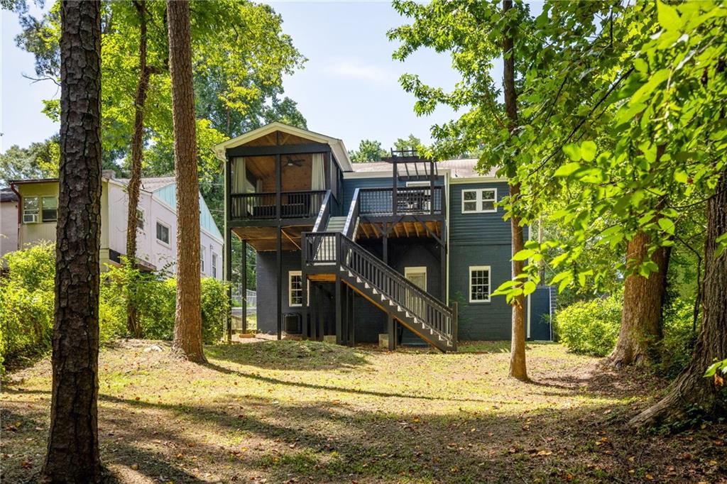 1675 Alvarado Terrace Southwest Atlanta, GA 30310 - Photo 22 of 26 a front view of a house with a yard