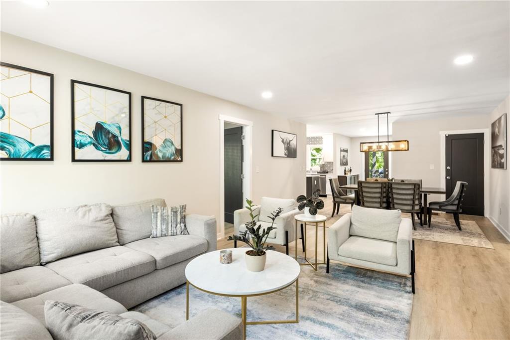 1675 Alvarado Terrace Southwest Atlanta, GA 30310 - Photo 7 of 26 a living room with furniture and a large window