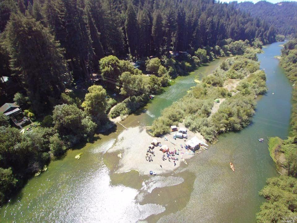 21600-21604 Moscow Road Monte Rio, CA 95462 - Photo 1 of 1 a bunch of flowers are sitting on a table