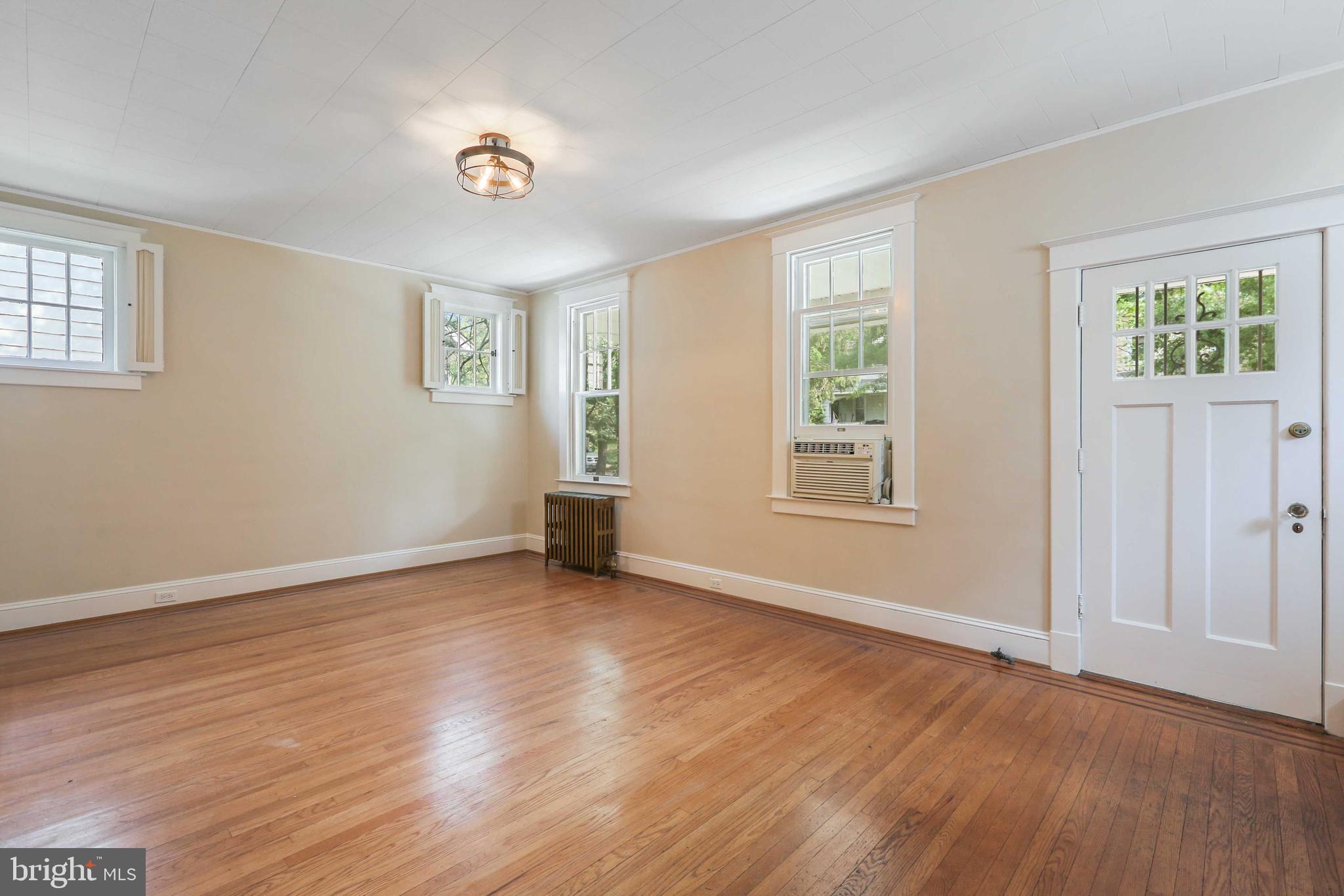 506 Westgate Road Baltimore, MD 21229 - Photo 8 of 60 deep moldings, 4 panel doors, and 6 over 1 windows