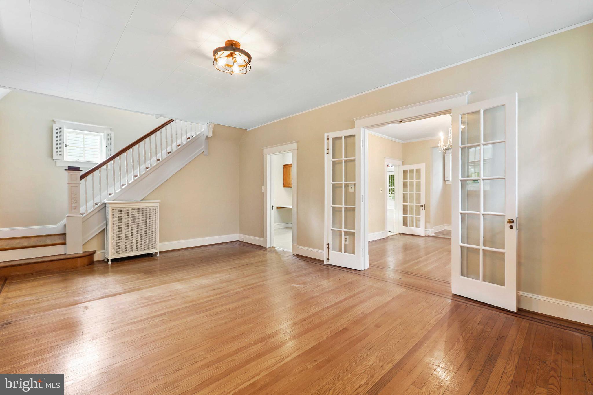 506 Westgate Road Baltimore, MD 21229 - Photo 10 of 60 French doors open to the Dining Room