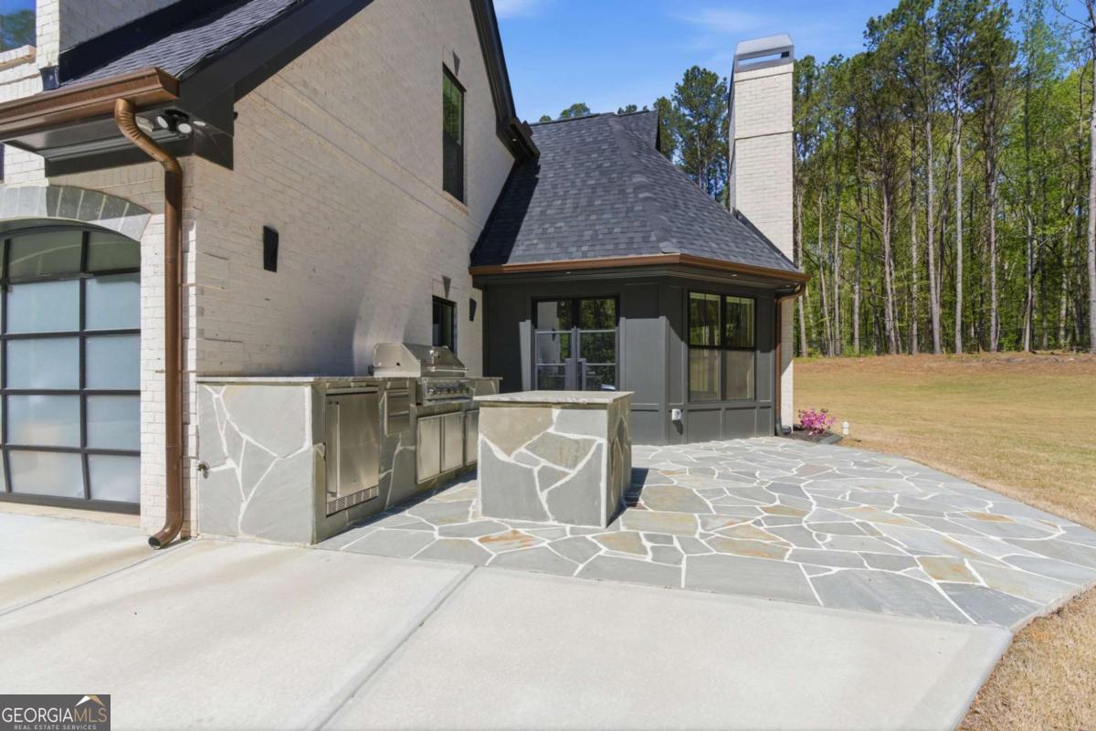 1315 Sandy Creek Road Tyrone, GA 30290 - Photo 11 of 100 a front view of a house with parking