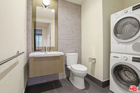 a room with furniture and a flat screen tv