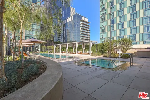 a view of a building with a swimming pool