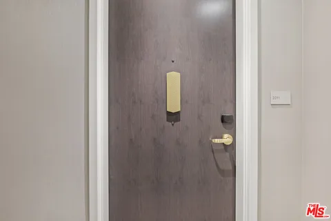 view of a bathroom with a sink and mirror