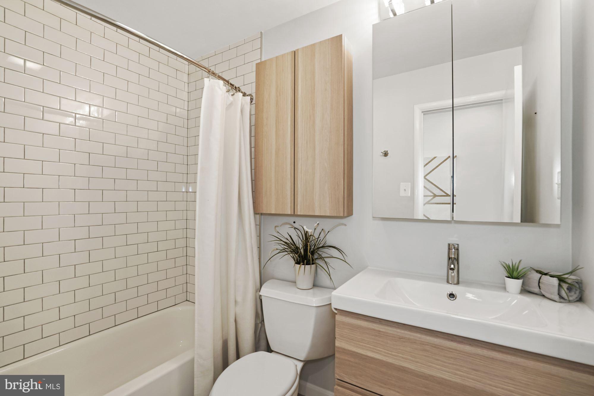 6203 Redwing Road Bethesda, MD 20817 - Photo 13 of 39 Shared bath on upper level, fully renovated