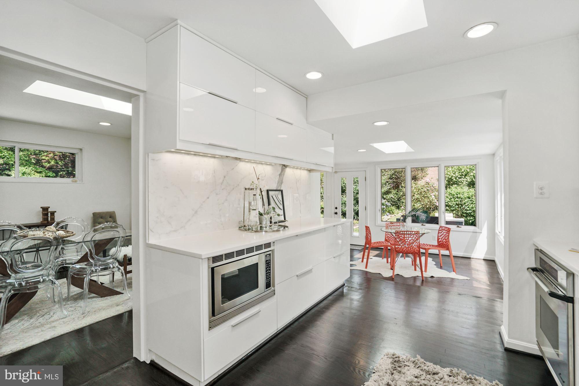 6203 Redwing Road Bethesda, MD 20817 - Photo 3 of 39 Pristine white kitchen opens to living and dining