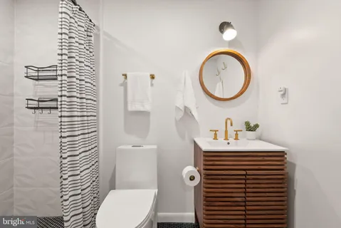 a view of a patio with a table chairs and a backyard
