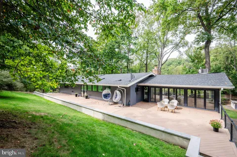 a view of a playground with basketball court