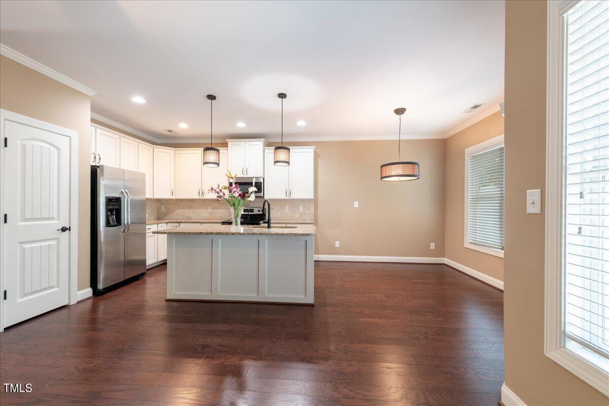 2115 Scarlet Maple Drive Raleigh, NC 27606 - Photo 11 of 32 a view of kitchen with refrigerator and window