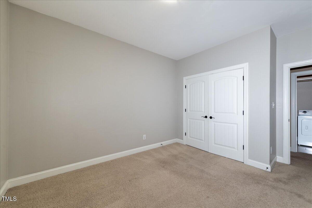 2115 Scarlet Maple Drive Raleigh, NC 27606 - Photo 26 of 32 a view of an empty room