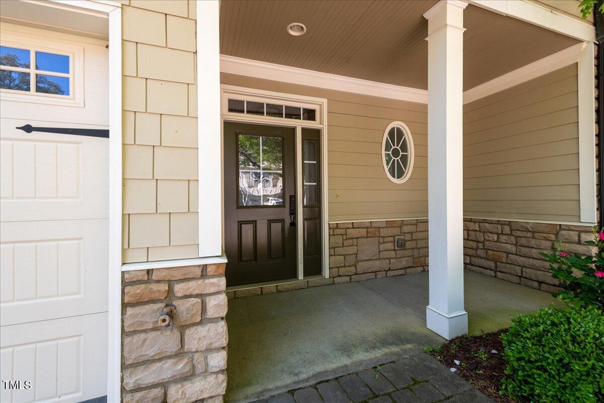 2115 Scarlet Maple Drive Raleigh, NC 27606 - Photo 4 of 32 a view of door with an empty room