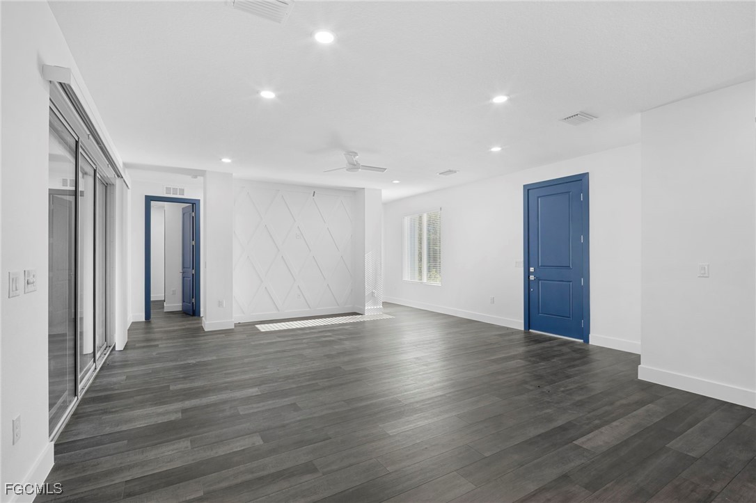 2816 Barry Road North Port, FL 34286 - Photo 29 of 36 a view of an empty room with wooden floor