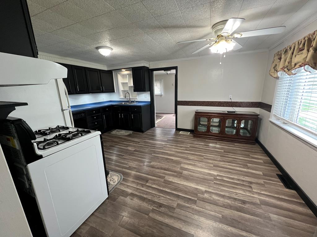 1169 Mercer Road Franklin, PA 16323 - Photo 15 of 29 a kitchen with stainless steel appliances granite countertop a stove and a refrigerator
