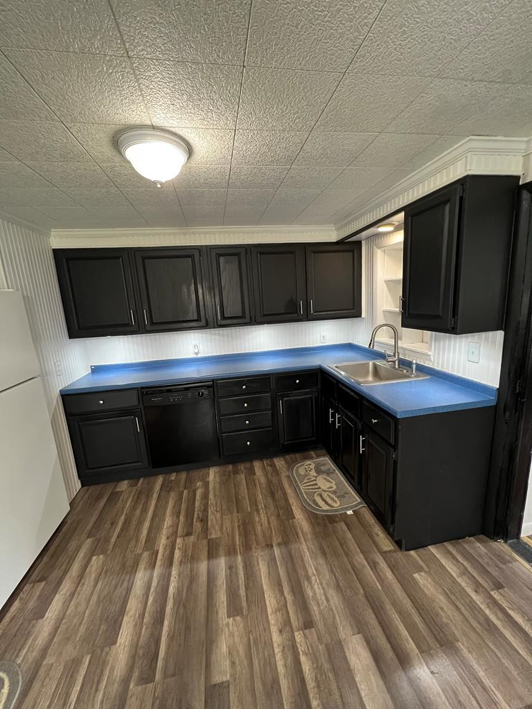 1169 Mercer Road Franklin, PA 16323 - Photo 16 of 29 a kitchen with a sink and a stove top oven