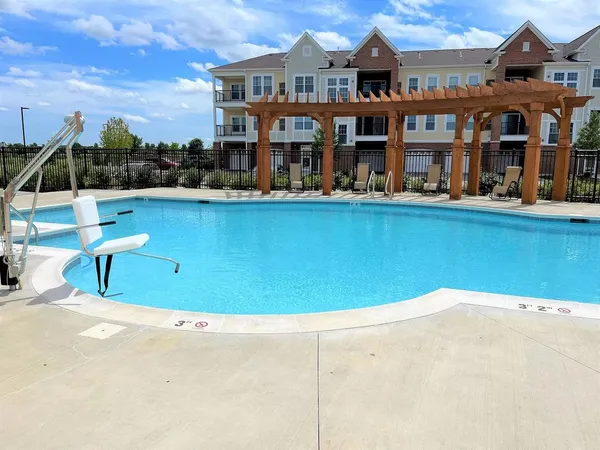 a front view of a house with swimming pool
