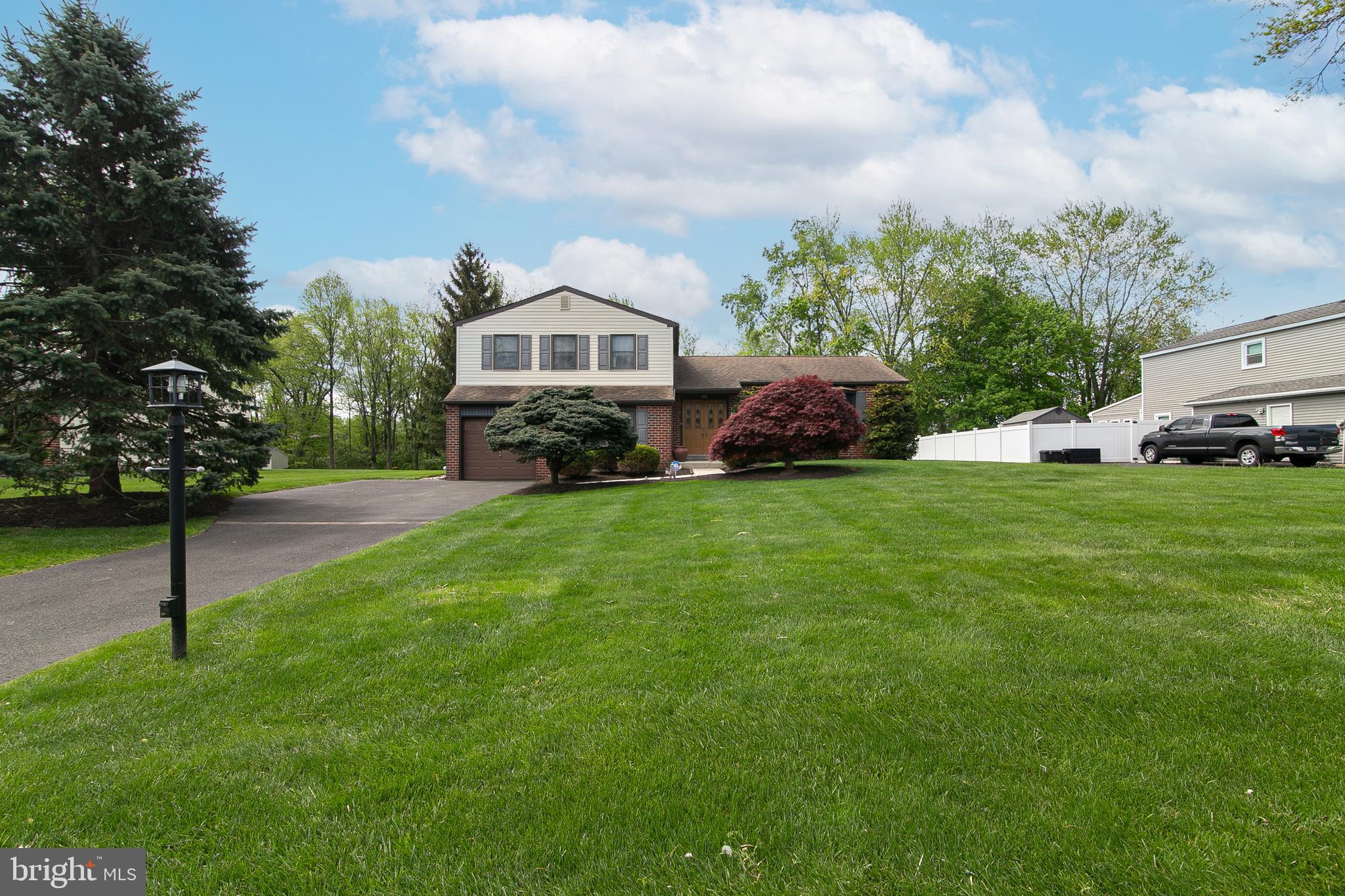 51 Rotterdam Road West Holland, PA 18966 - Photo 1 of 53 a front view of a house with a yard