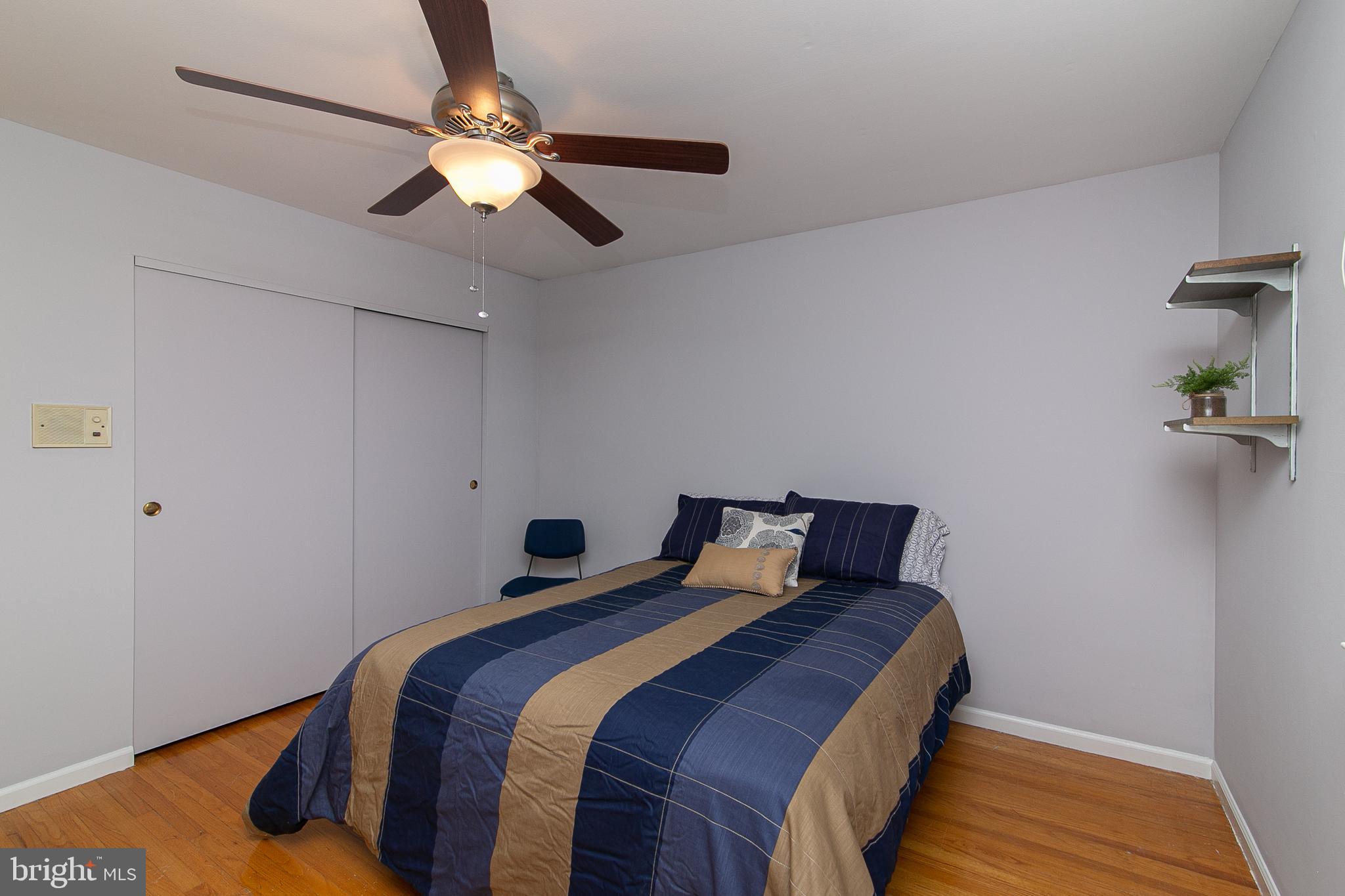 51 Rotterdam Road West Holland, PA 18966 - Photo 31 of 53 a bedroom with a bed and a chandelier