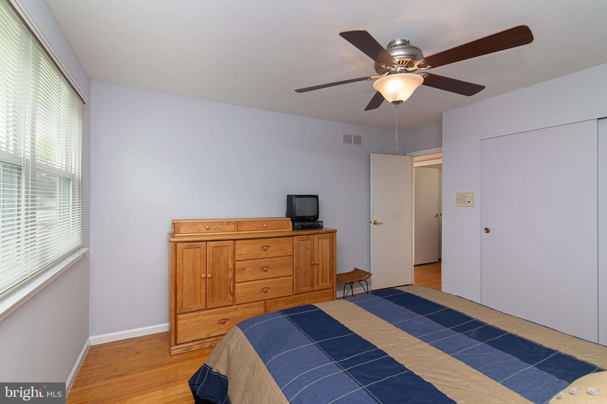 51 Rotterdam Road West Holland, PA 18966 - Photo 32 of 53 a bedroom with a bed and a chandelier fan
