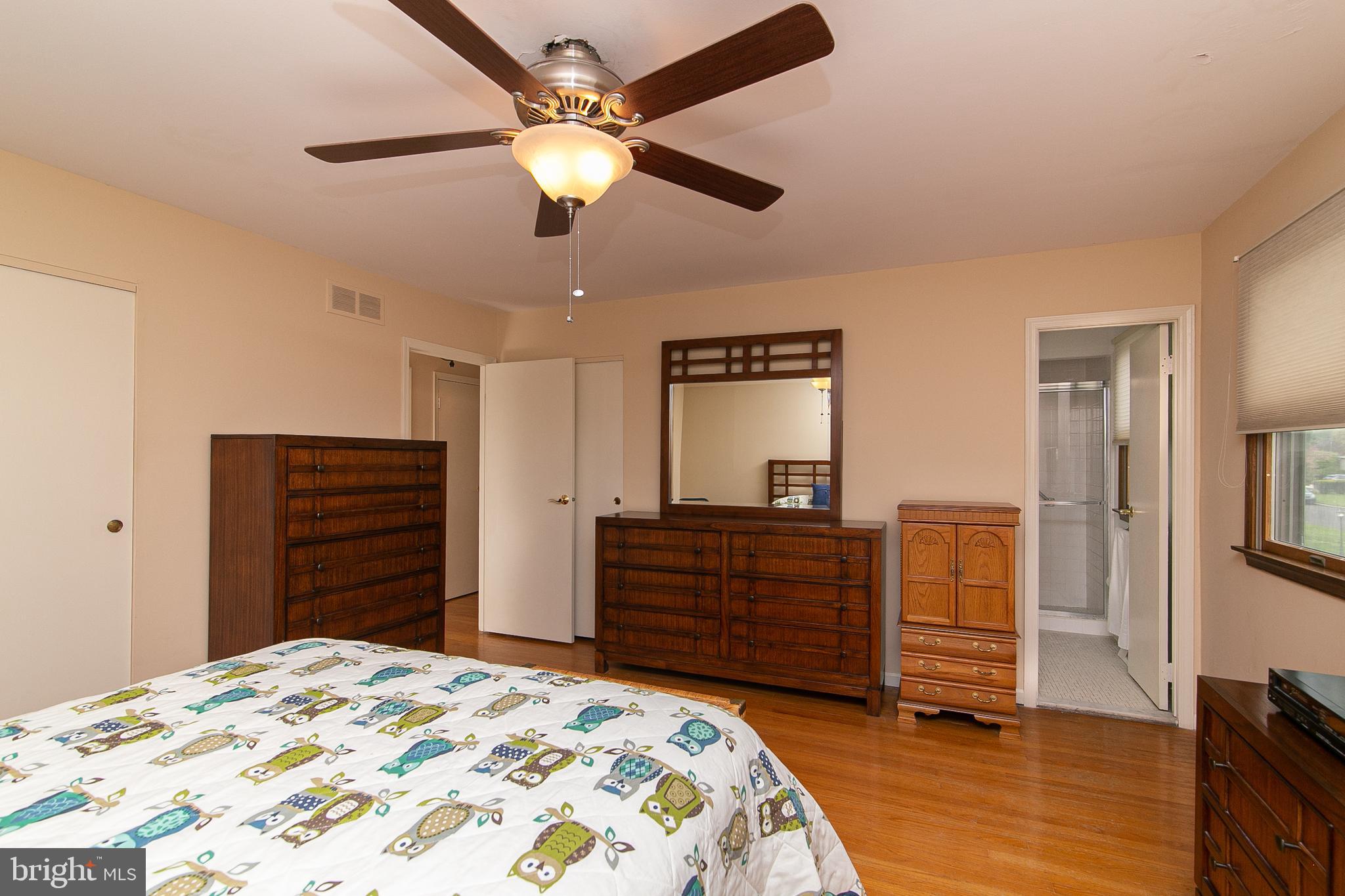 51 Rotterdam Road West Holland, PA 18966 - Photo 35 of 53 a bedroom with a bed and a chandelier