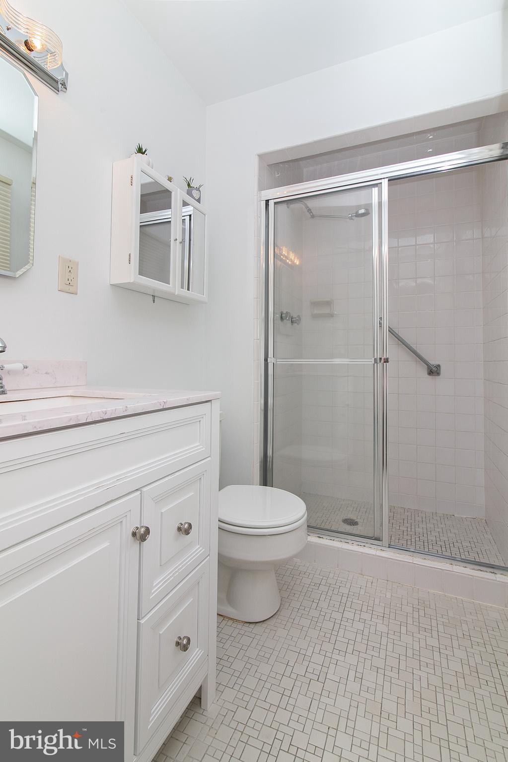 51 Rotterdam Road West Holland, PA 18966 - Photo 37 of 53 a bathroom with a toilet a sink and shower