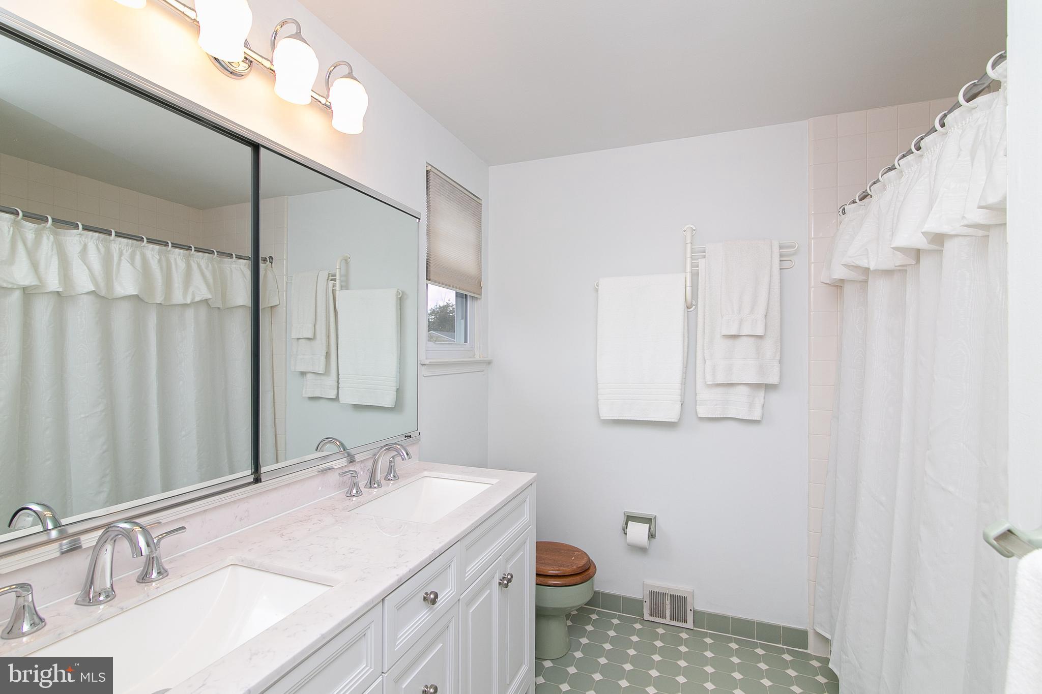 51 Rotterdam Road West Holland, PA 18966 - Photo 38 of 53 a bathroom with a bathtub sink vanity and a shower