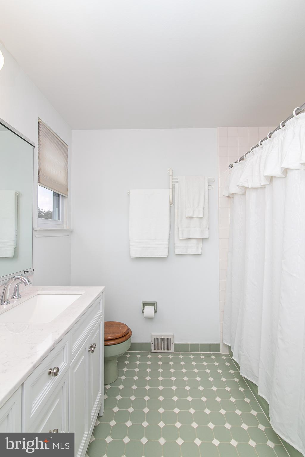 51 Rotterdam Road West Holland, PA 18966 - Photo 40 of 53 a bathroom with a sink a toilet and vanity