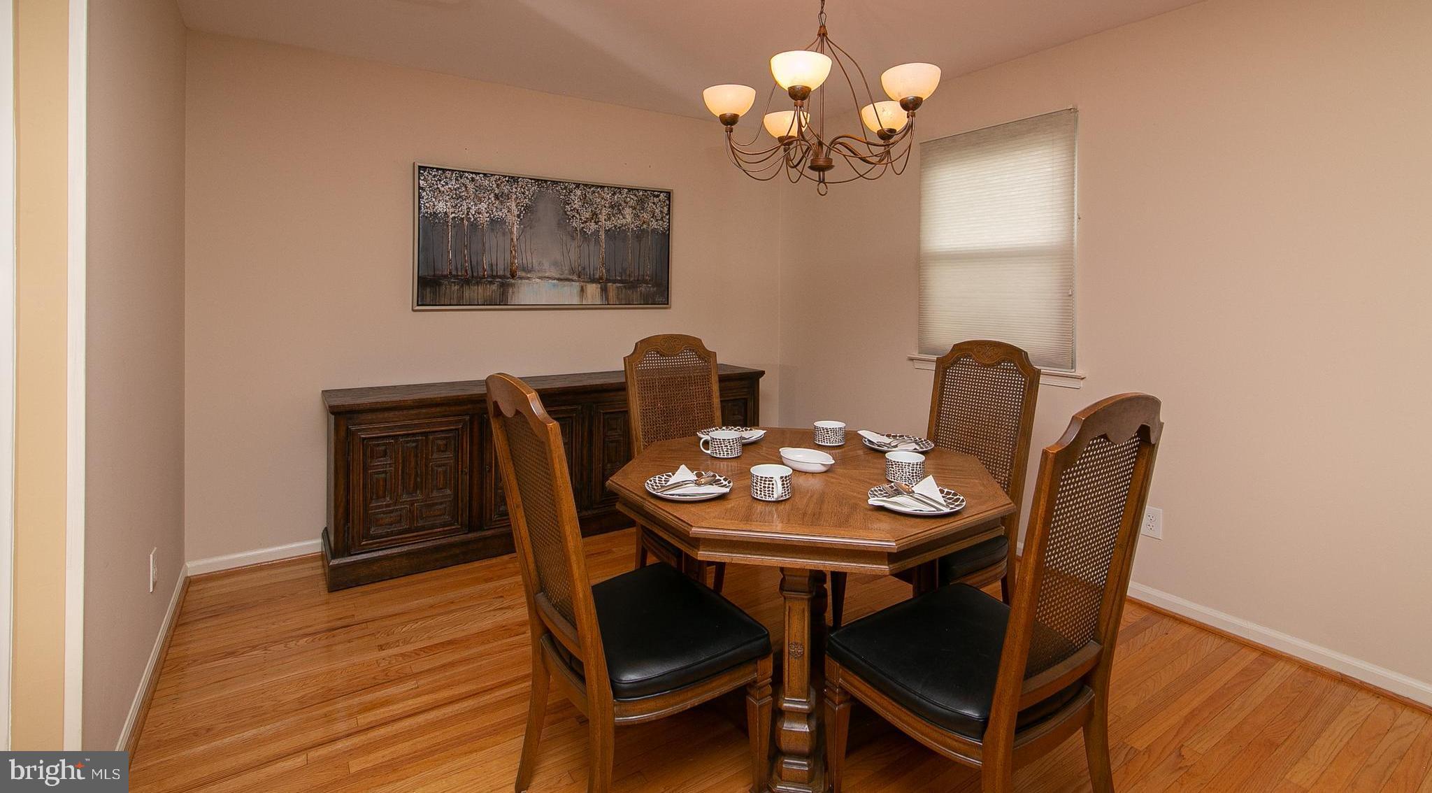 51 Rotterdam Road West Holland, PA 18966 - Photo 8 of 53 a view of a dining room with furniture and wooden floor