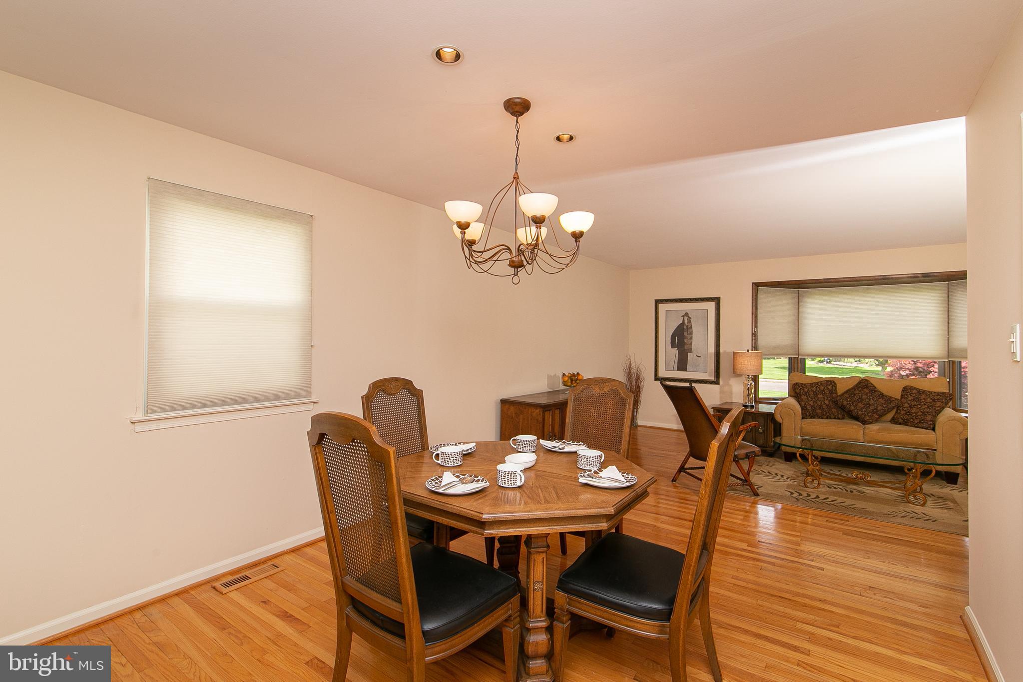 51 Rotterdam Road West Holland, PA 18966 - Photo 9 of 53 a dining room with furniture a chandelier and wooden floor