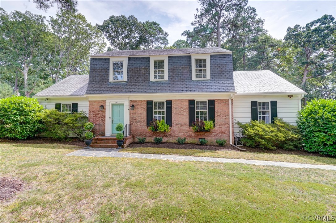 3421 Kenmore Road Richmond, VA 23225 - Photo 1 of 41 a front view of a house with a yard