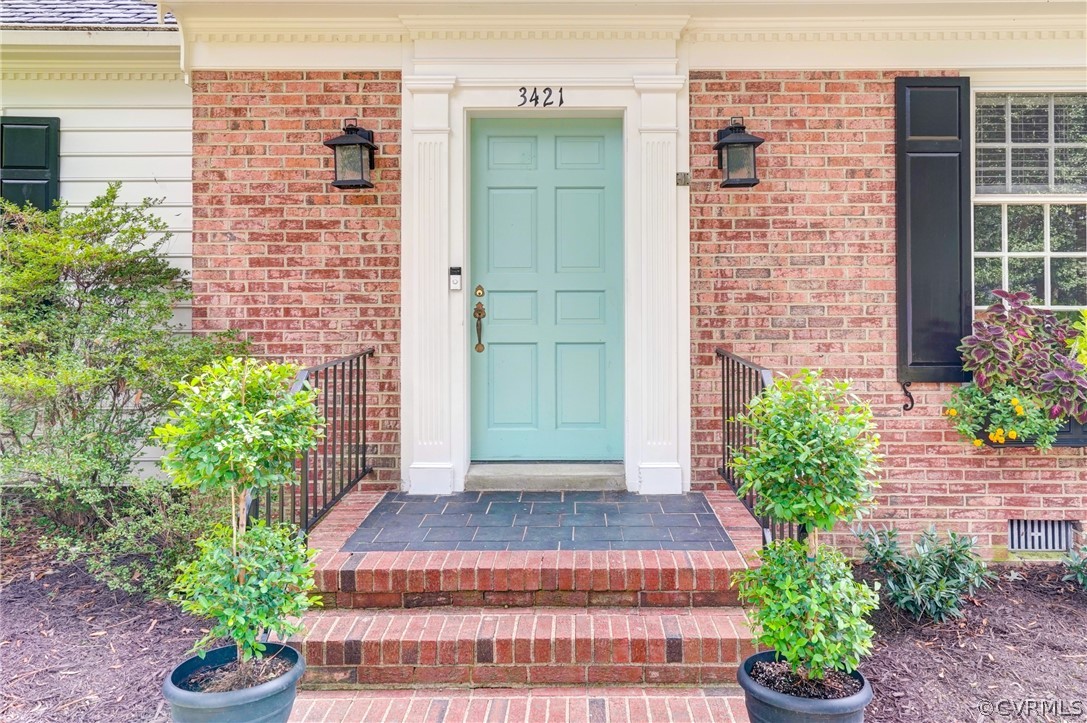 3421 Kenmore Road Richmond, VA 23225 - Photo 2 of 41 a view of front door of house with potted plant