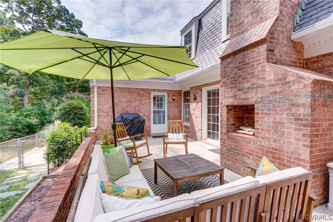 3421 Kenmore Road Richmond, VA 23225 - Photo 36 of 41 a view of deck with furniture and umbrella