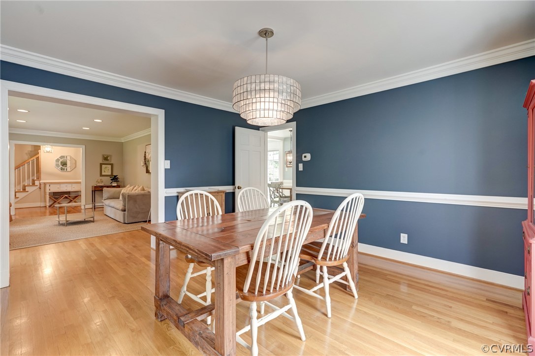 3421 Kenmore Road Richmond, VA 23225 - Photo 9 of 41 a view of a dining room with furniture and chandelier