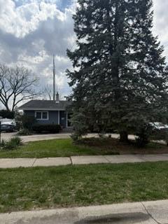 1236 Fisher Street Munster, IN 46321 - Photo 1 of 29 a front view of a house with a garden