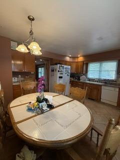 1236 Fisher Street Munster, IN 46321 - Photo 12 of 29 a dining room with furniture and window