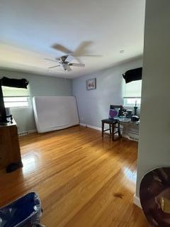 1236 Fisher Street Munster, IN 46321 - Photo 13 of 29 a room with furniture and a wooden floor