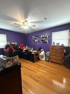 1236 Fisher Street Munster, IN 46321 - Photo 14 of 29 a room with large bed and chandelier